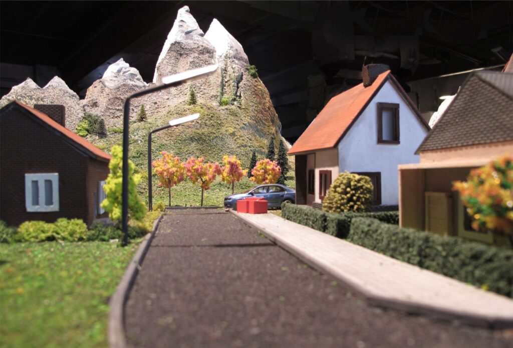 Miniaturowa makieta do reklamy auta – model krajobrazu do zdjęć i filmu